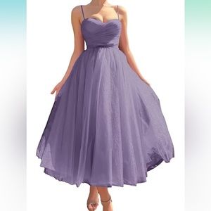Beautiful tulle tea length gown with pockets
